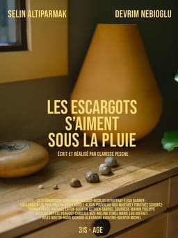 Les escargots s'aiment sous la pluie